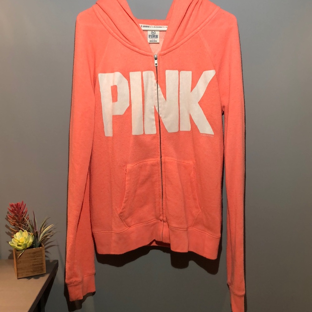 Zip up from PINK. Fade wash.